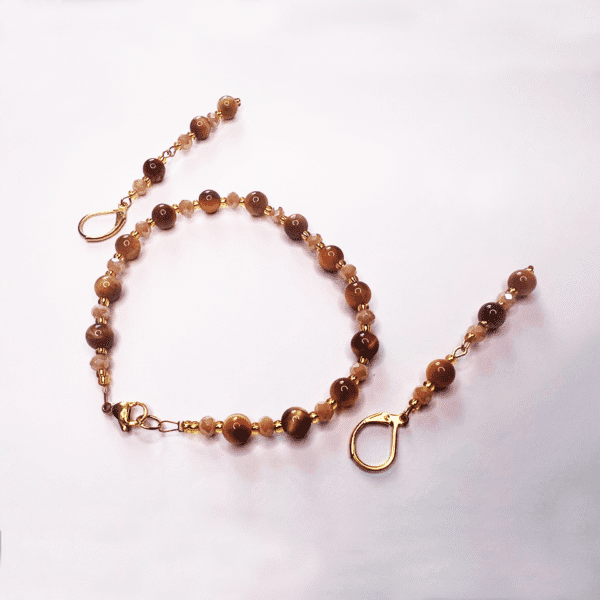 Juego de pulsera y aretes de ojo de tigre marrón, verde y amarillo.